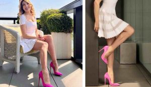 Barbara D'Urso con scarpe fucsia